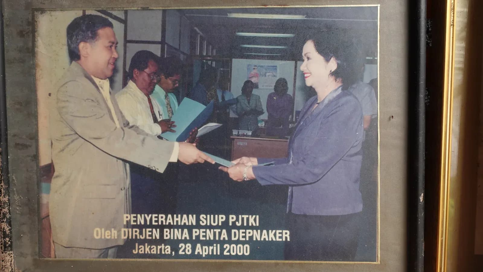 Handover of the SIUP by the Director General of Bina Penta, Disnaker, in 2000